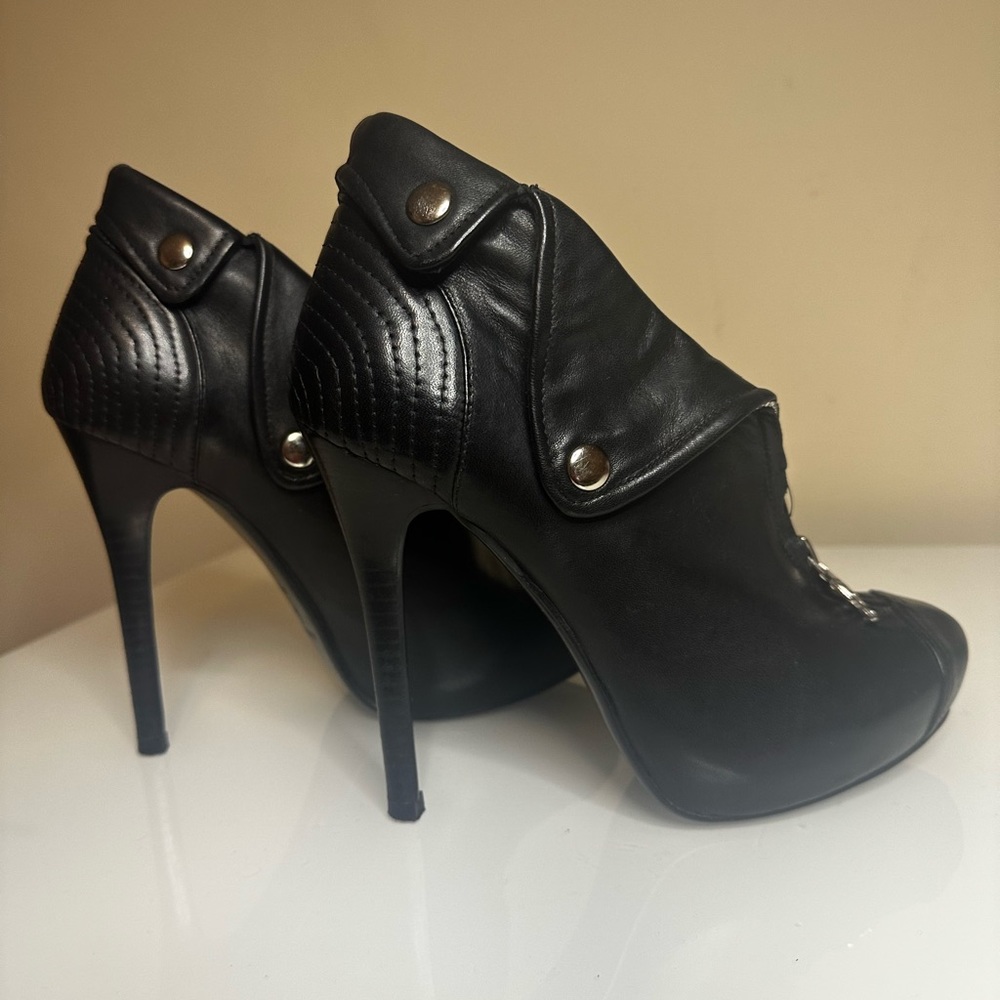 Alexander McQueen high heels.